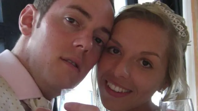 Close-up portrait selfie of a happy couple smiling together, representing improved lifestyle confidence and vitality.